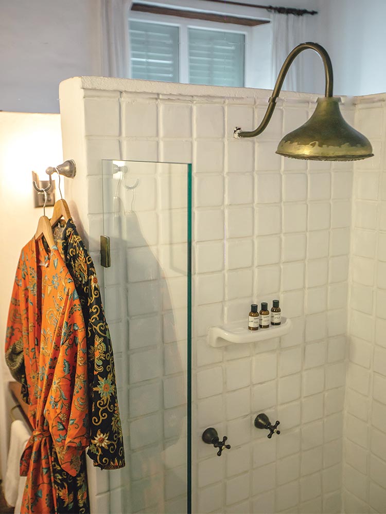 Shower and robes in Macaw suite in Amarla Boutique Hotel
