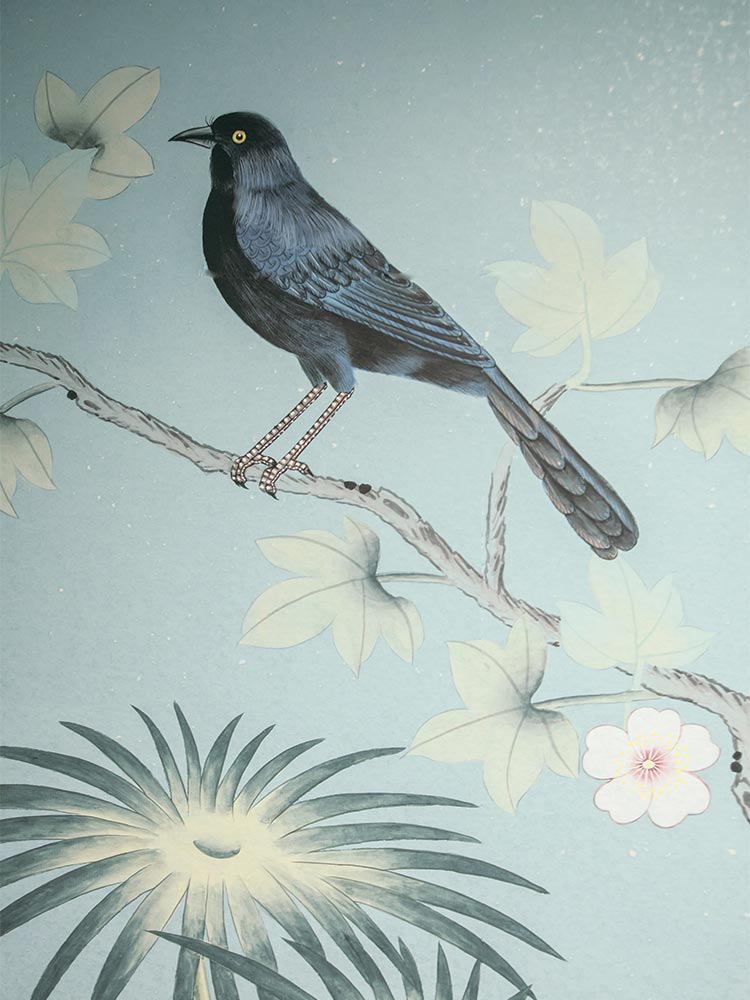Beautiful illustration of blue Mulata bird amongst flowers in Maria Mulata room at Amarla Hotel in Cartagena