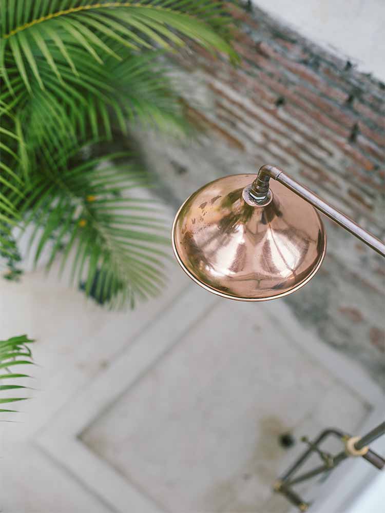 Arial view of copper shower near the pool of the rooftop pool at Amarla boutique hotel in Cartagena