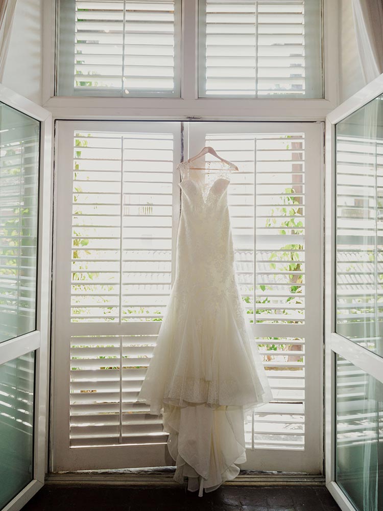 Wedding dress hanging awaiting Cartagena bride's arrival, perfectly organised by the Amarla Cartagena wedding planner